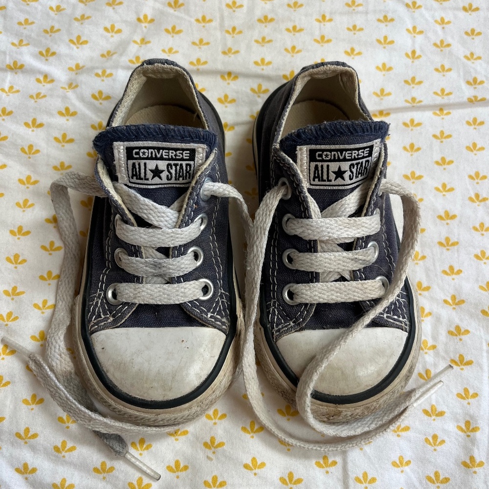 Navy blue Converse All Stars lace-up sneakers